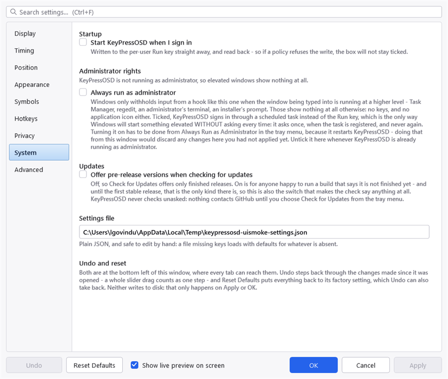 The System tab, showing the settings file path and startup options
