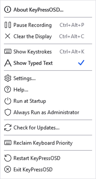 The tray menu with Show Typed Text ticked instead of Show Keystrokes